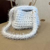 Borsa clutch a uncinetto
