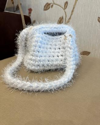 Borsa clutch a uncinetto