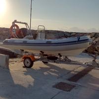 Gommone motore e carrello