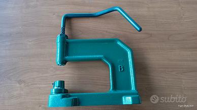 torchietto per bottoni a pressione 