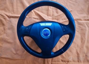 Sterzo grande punto comandi al volante