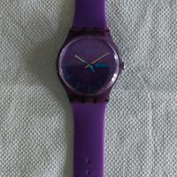 Orologio swatch QUARTZ. Colore viola