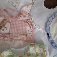 Bavaglie, bavette NUOVE ricamo punto croce