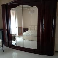 Stanza da letto in mogano