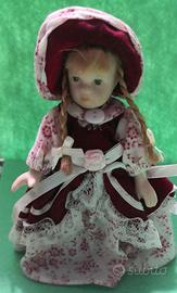 Bambola di porcellana, bambola da collezione.