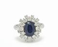 anello-zaffiro-con-contorno-diamanti-ct-0-96