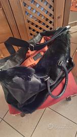 Borsone in pelle e pelliccia JOST