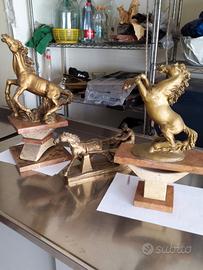 Trofei cavalli in marmo