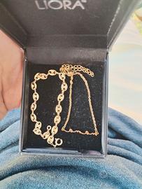 Lotto composto da bracciale e catenina con scritta