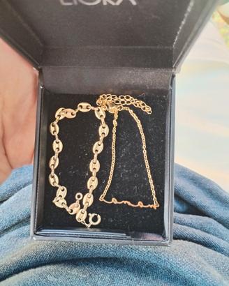 Lotto composto da bracciale e catenina con scritta