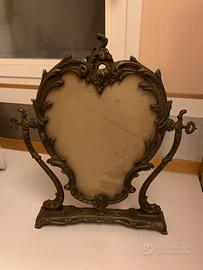 Cornice per specchio basculante