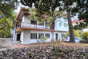 Casa indipendente e terreno edificabile