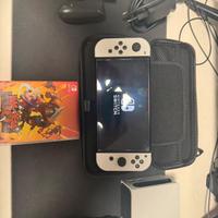 Nintendo Switch OLED + Controller Pro + 2 Giochi