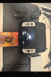 Nintendo Switch OLED + Controller Pro + 2 Giochi