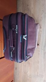 trolley in pelle con portacomputer