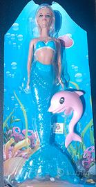 Bambola sirenetta con delfino