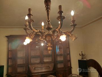 lampadari in legno dorati.Color oro