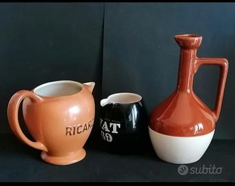 Tre caraffe vintage in ceramica smaltata