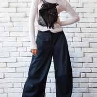 pantaloni larghi Suoli