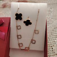 collanina ed orecchini, color oro e nero