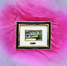 quadretto vintage con una scena di paes