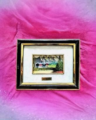 quadretto vintage con una scena di paes