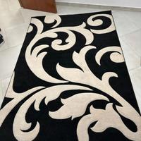 Tappeto bianco e nero