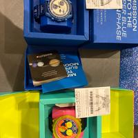 Orologio swatch neon e omega edizione limitata