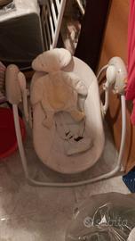 Dondolino  bambini  elettrico a batterie con music