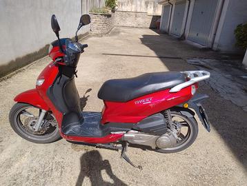 Peugeot Tweet 125 - Buono stato, bauletto nuovo