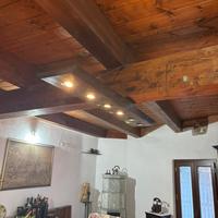 Lampada artigianale in legno massello su misura
