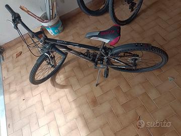 bici 24 cambio Shimano 18 rapporti con ammortizzat