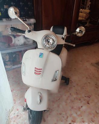 Vespa Peg Perego con rotelle