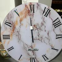 Orologio effetto marmo bianco in vetro