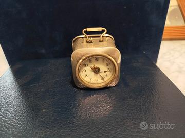 orologio ranocchio e quadro con orologio