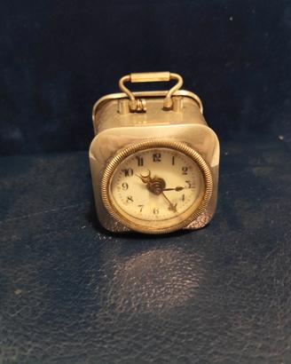 orologio ranocchio e quadro con orologio