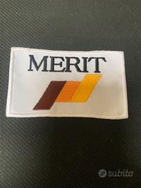 Toppa per vestiti merit pubblicitaria vintage
