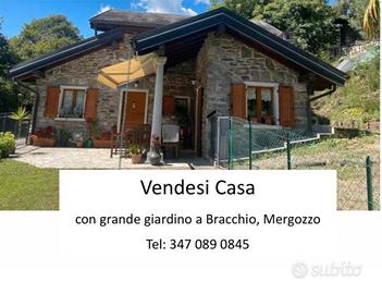 Casa con giardino