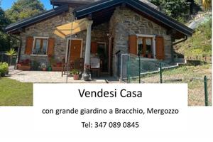 Casa con giardino