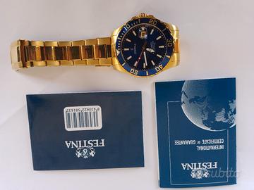 orologio dorato da uomo