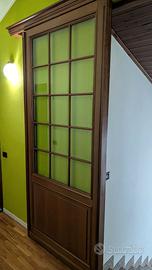 Porta scorrevole con vetrata