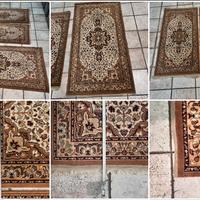 Vecchi tappeti vintage scendi letto