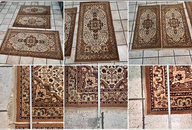 Vecchi tappeti vintage scendi letto