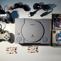 PlayStation 1 + 2 giochi + 2 joystick