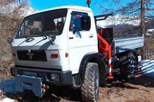 Macchina operatrice MAN 9.150 4x4 con gru