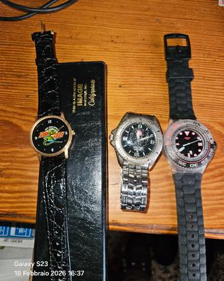 tre orologi  immage nuovo swatch e Suisse military