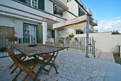 Villa a schiera con cortile