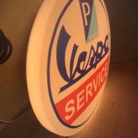 Insegna luminosa vespa service