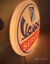 Insegna luminosa vespa service