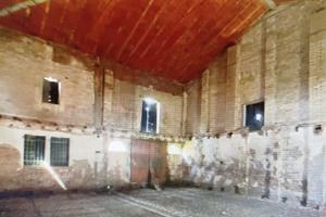 Casa capannone terra
